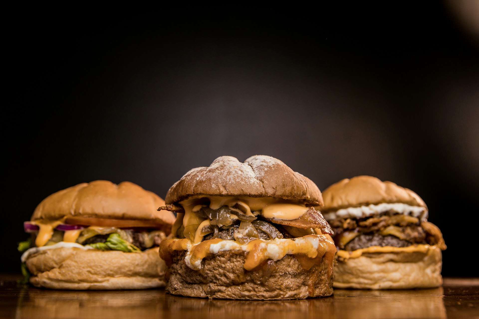 burger on brown wooden table